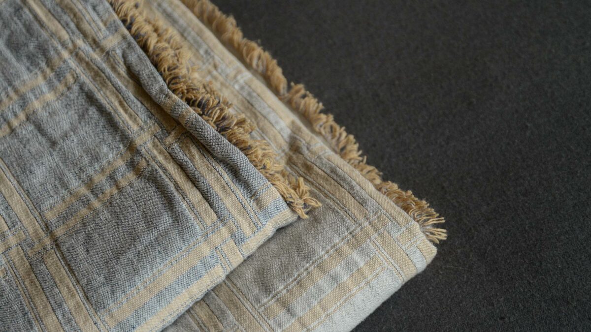grey and gold double check throws in organic cotton