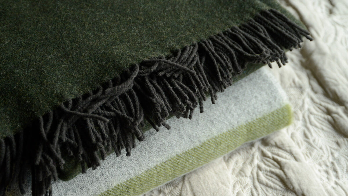 grey and green throws stack