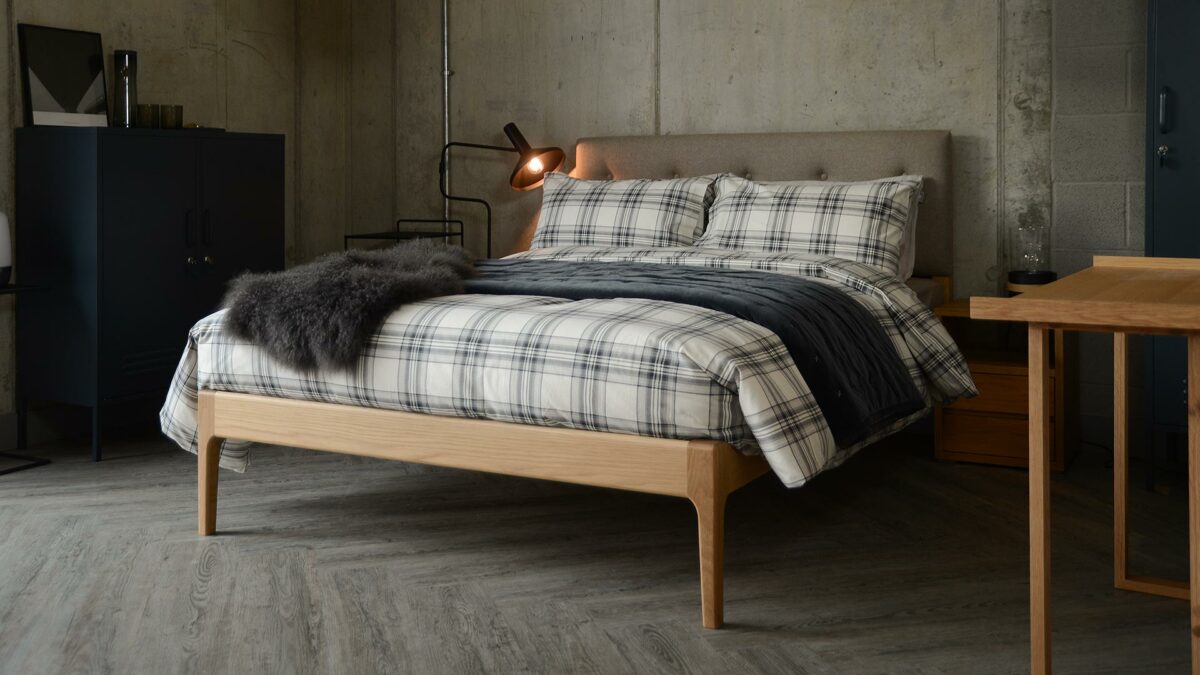 Scandinavian style bedroom with oak Bloomsbury bed and cosy bedding