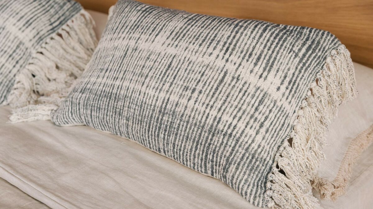 grey and ivory cushion