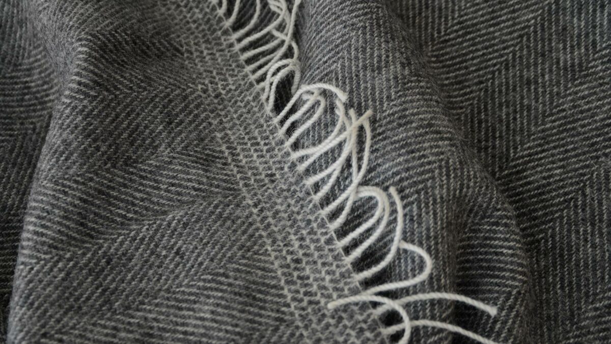 grey and ivory pure wool throw herringbone and stripe detail