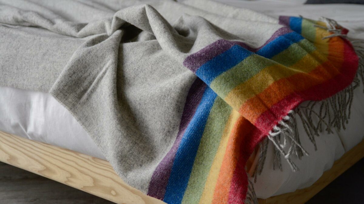 grey and multicolour throw detail