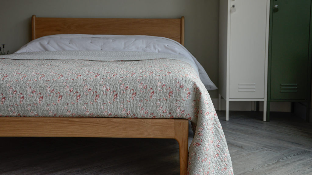 grey, vintage look reversible bedspread