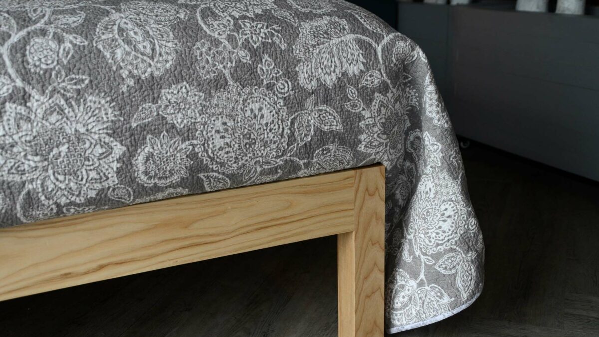 grey and white floral bedspread
