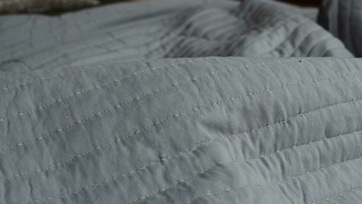 grey-and-white-reversible-stitched-bedspread