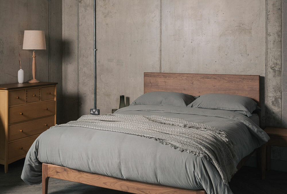grey bedding on Chiswick walnut bed portrait