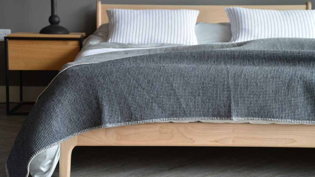 grey cosy waffle throw on pimlico bed