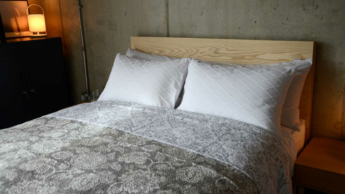 grey cream and white classic reversible bedspread