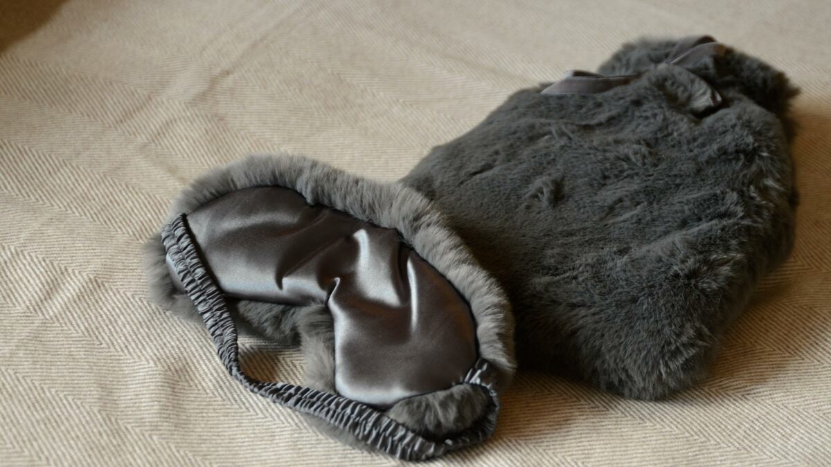 softest luxury faux fur hotwater bottle and eye mask set in charcoal grey