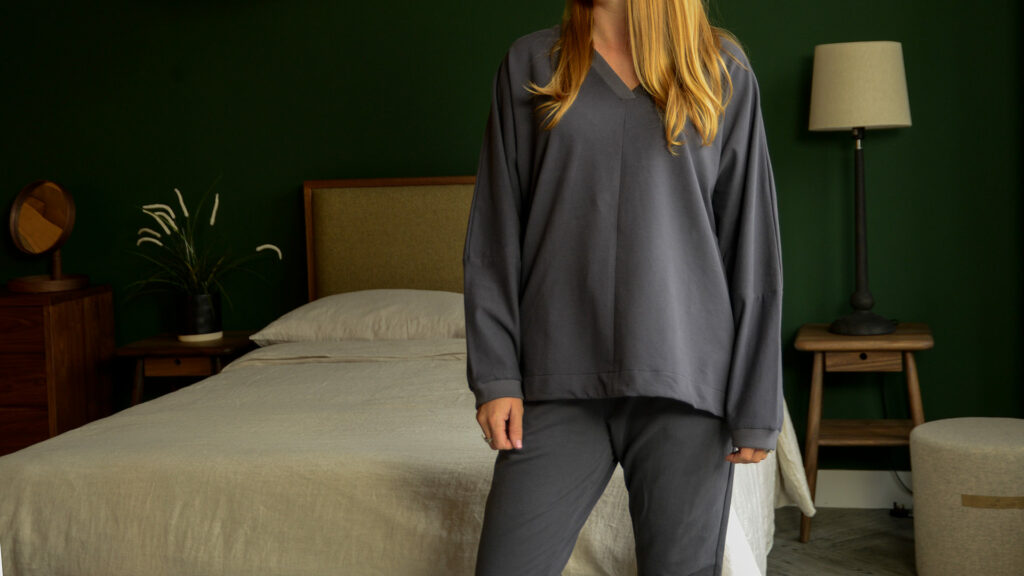 dark grey fleecy loungewear shown on our model