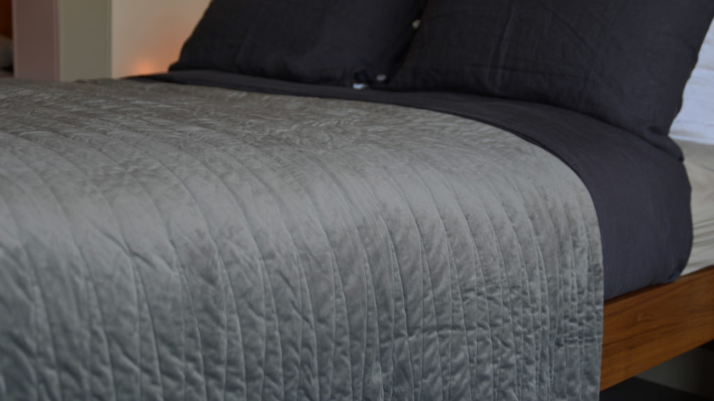 Grey velvet look harlequin bedspread