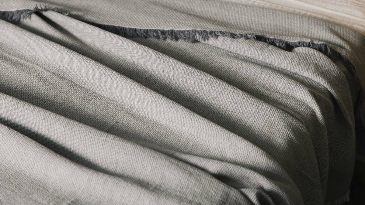 grey organic linen bedspread detail