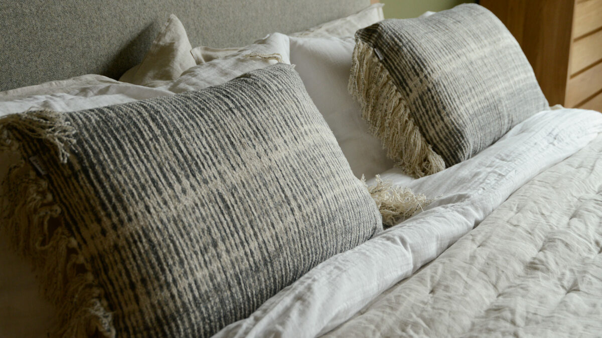 grey stripe tasselled cushions