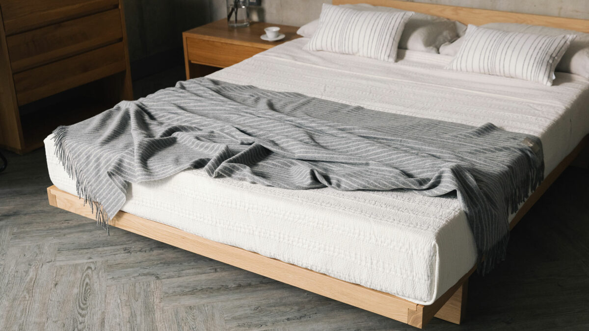 grey striped throw on low kumo bed