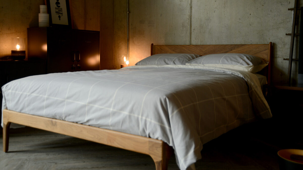 grey & ivory reversible duvet set in brushed cotton shown on our exclusive Hoxton wooden bed.