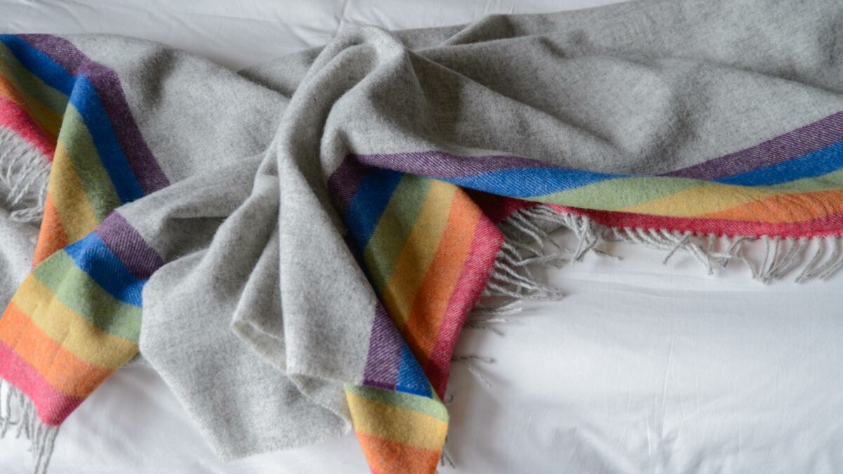 grey wool throw with rainbow edge