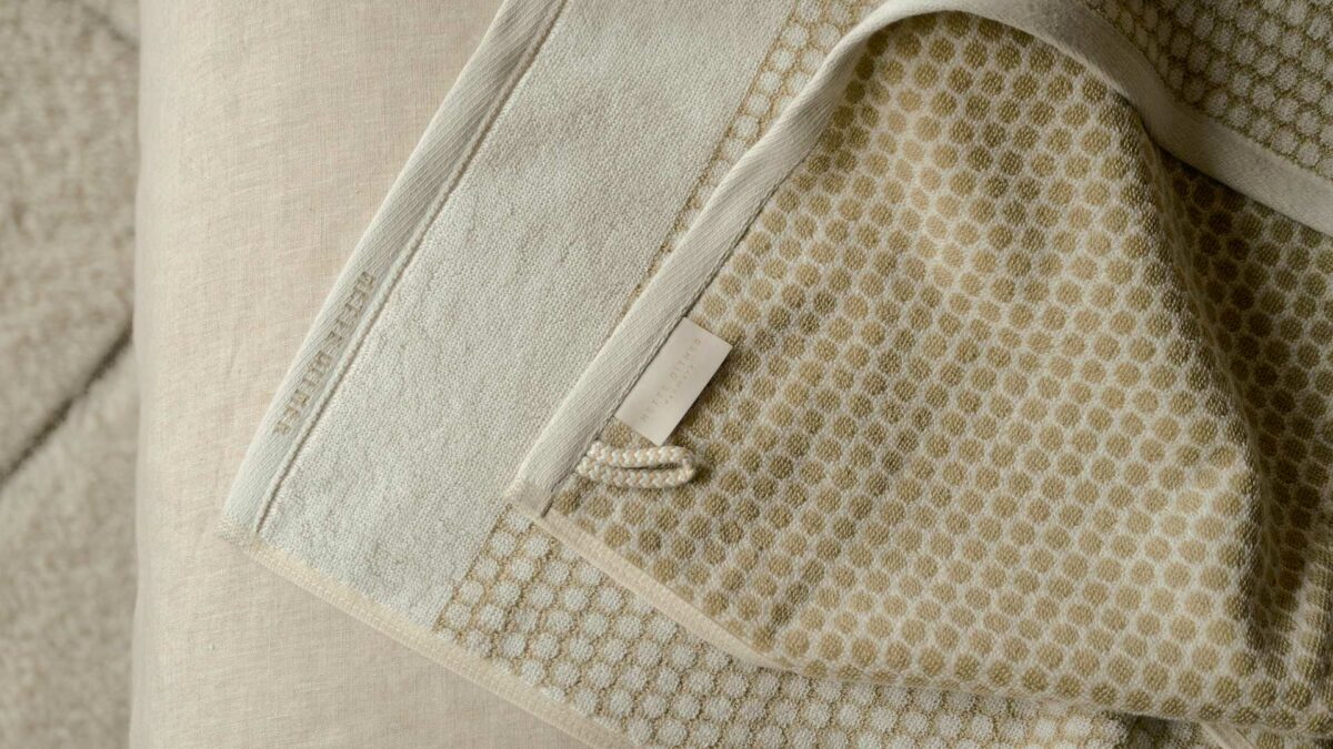 grid white and beige towel