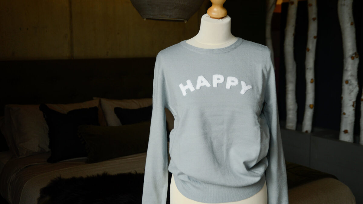 happy motif pale blue jumper