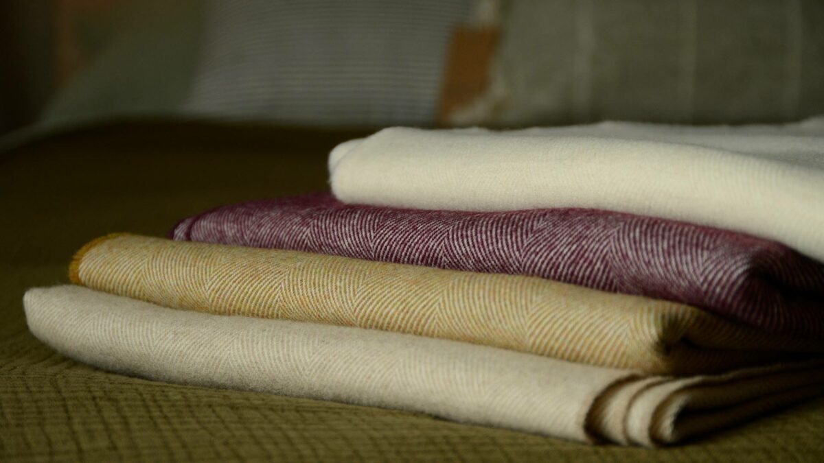 herringbone throws beige gold berry and ivory
