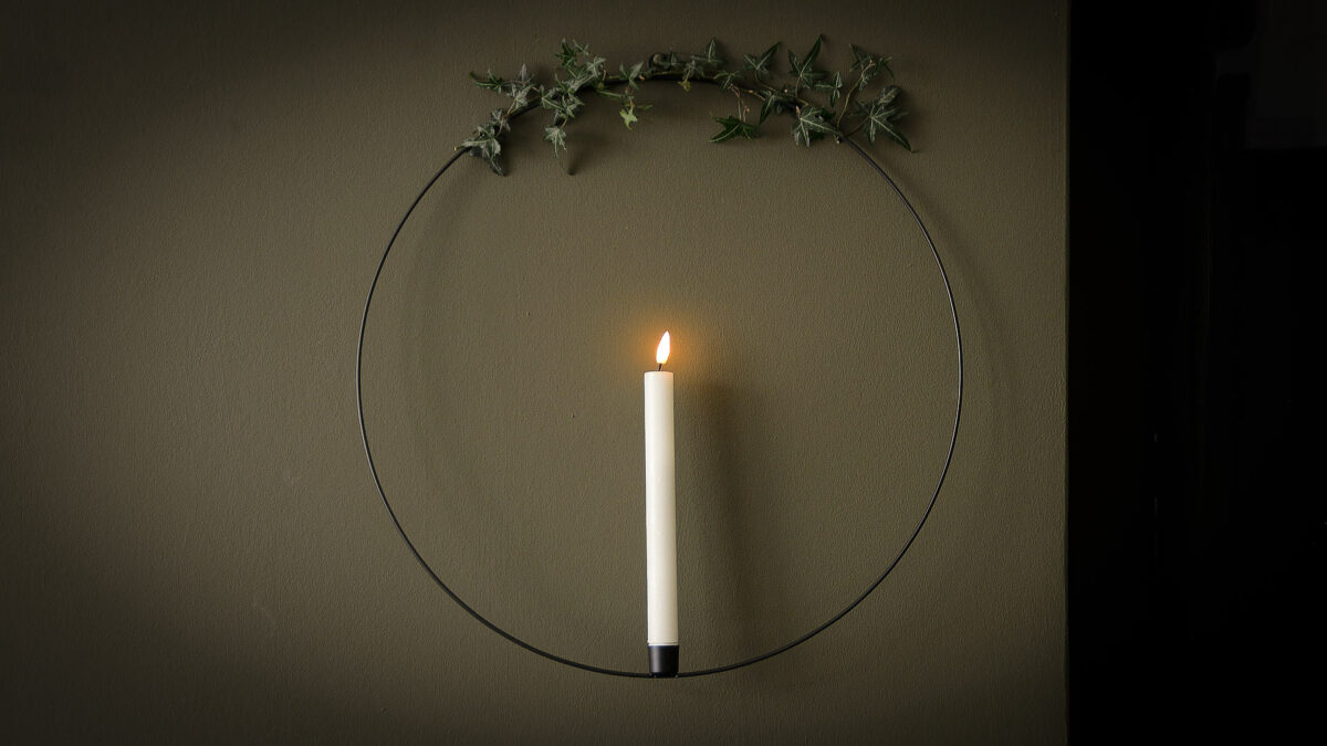 hoop with battery powered candle and added ivy