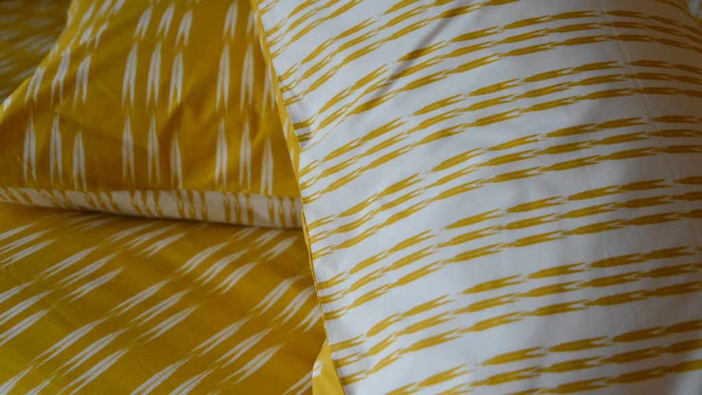 ikat-stripe-reversible-bedding-ochre