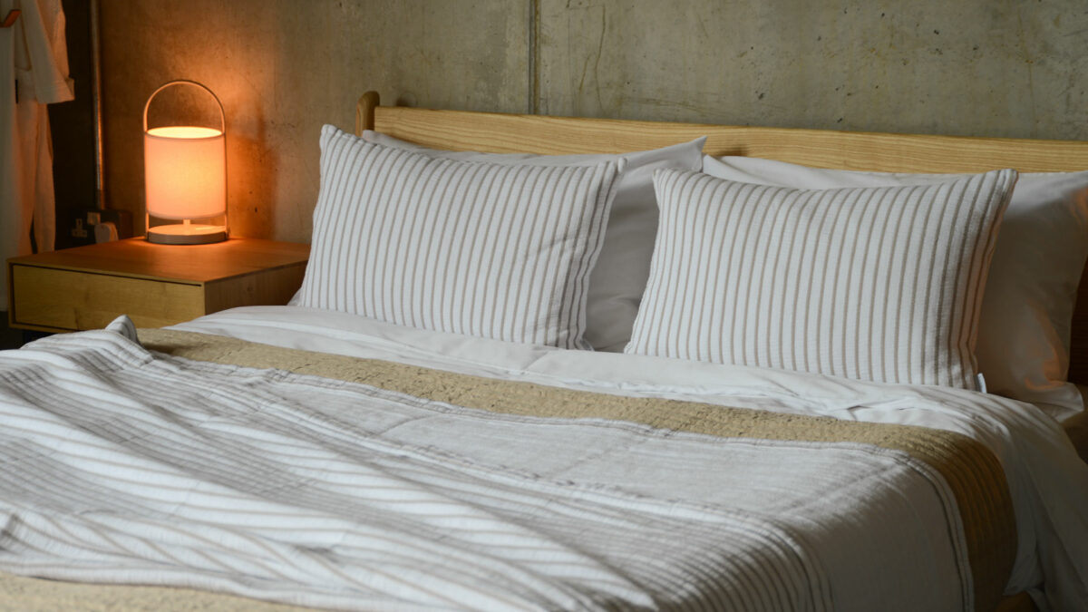 ivory and taupe striped bedspread with matching cushions 1920