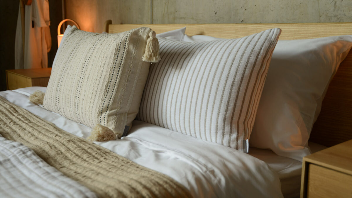 ivory and taupe striped cushions