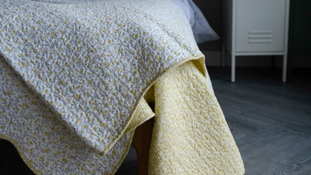 ivory and yellow floral print reversible bedspread