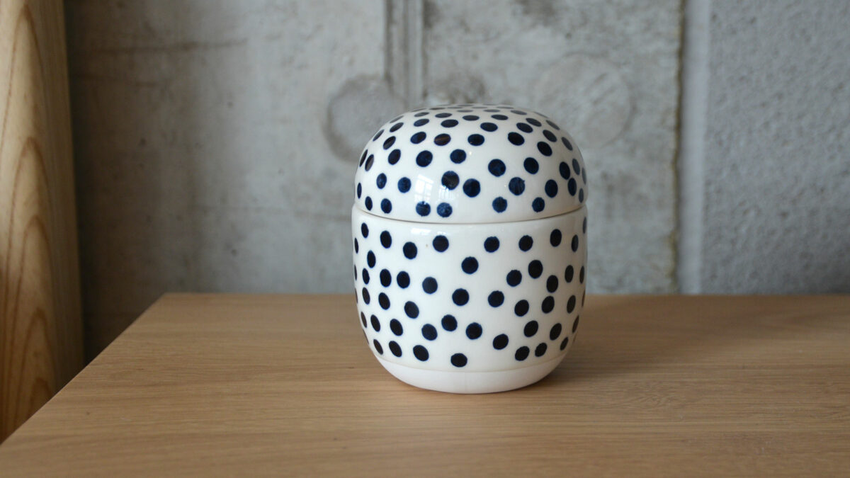 ivory ceramic jar with indigo spots