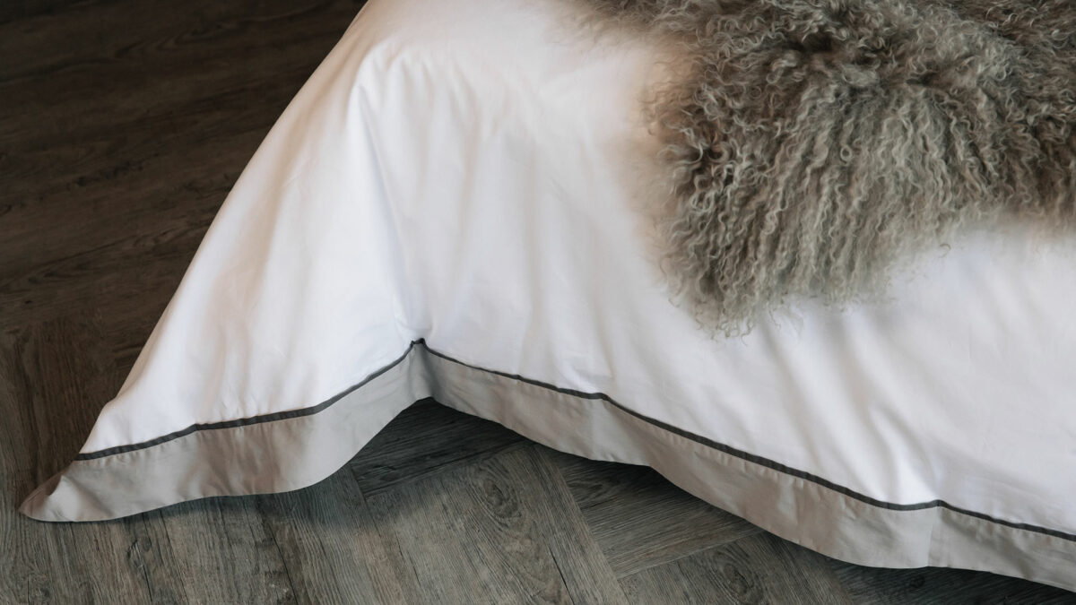 ivory cotton duvet with taupe border detail