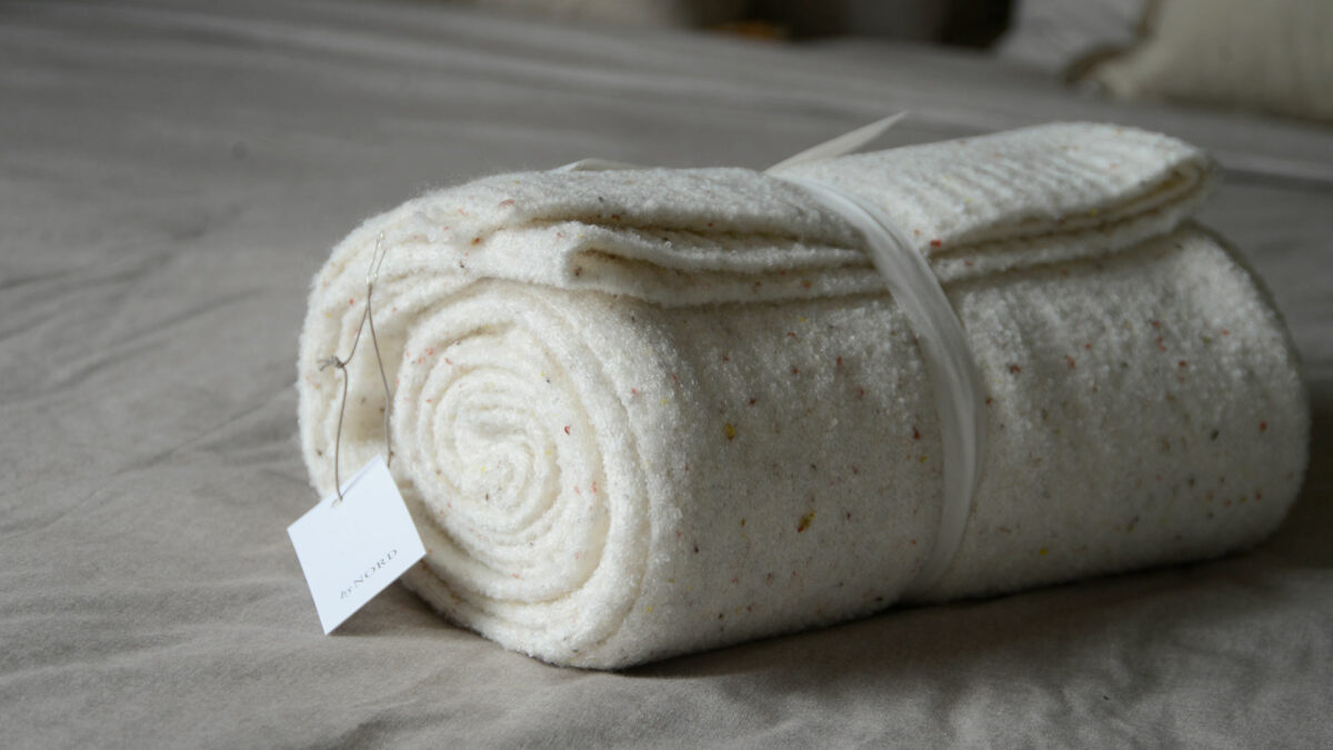 ivory throw with flecks of colour 1920