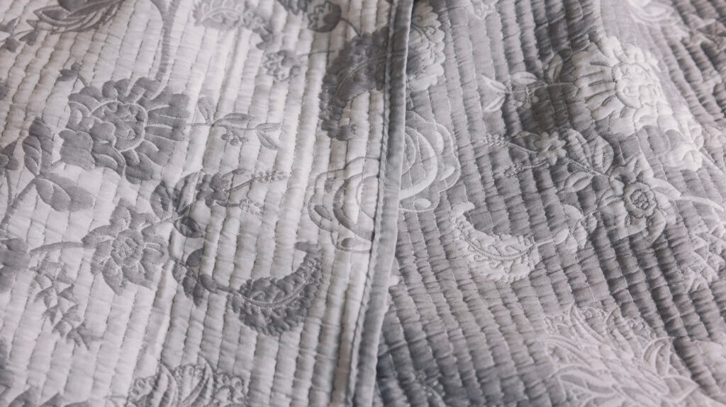 jacquard bedspread in grey detail