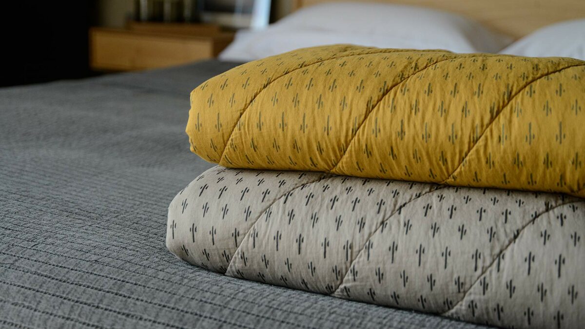 grey or yellow printed quilts