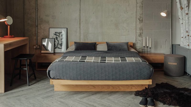 Industrial look bedroom with solid Oak Kyoto bed and grey bedding.