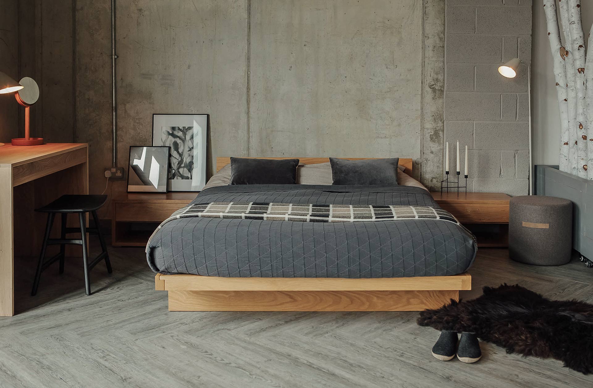 Industrial look bedroom with solid Oak Kyoto bed and grey bedding.