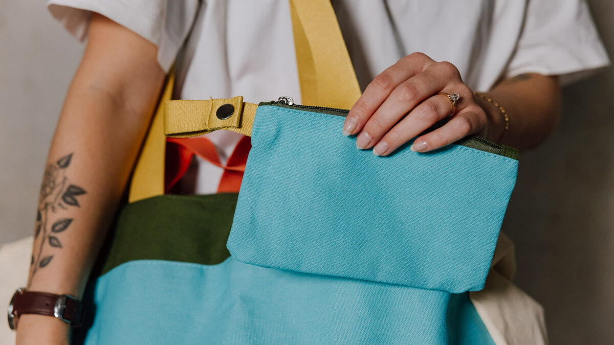 large colourful tote bag with purse