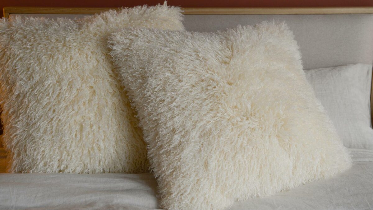 large cream cushions faux afghan