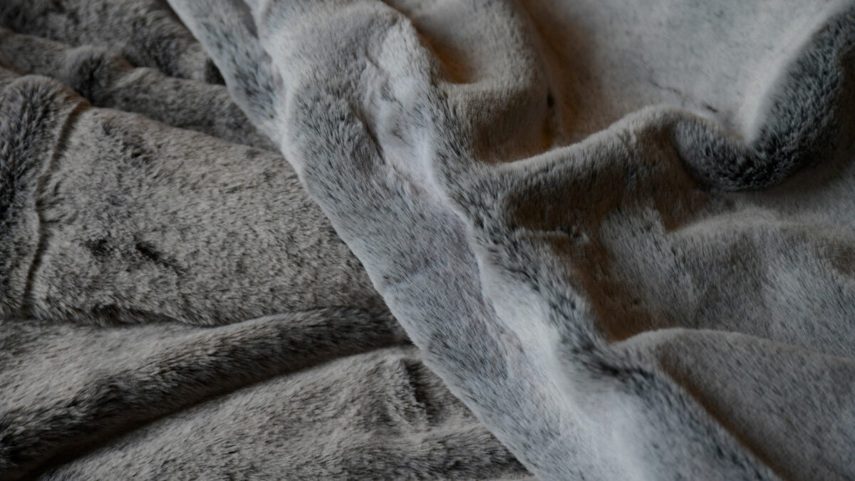 large soft faux fur throws in taupe and silver colour options