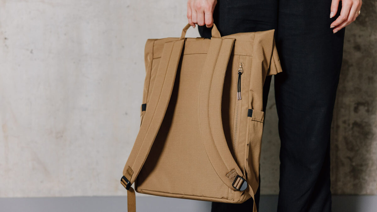 large roll top back pack back view