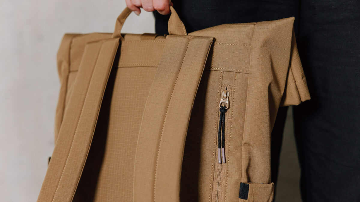 large roll top back pack zip detail