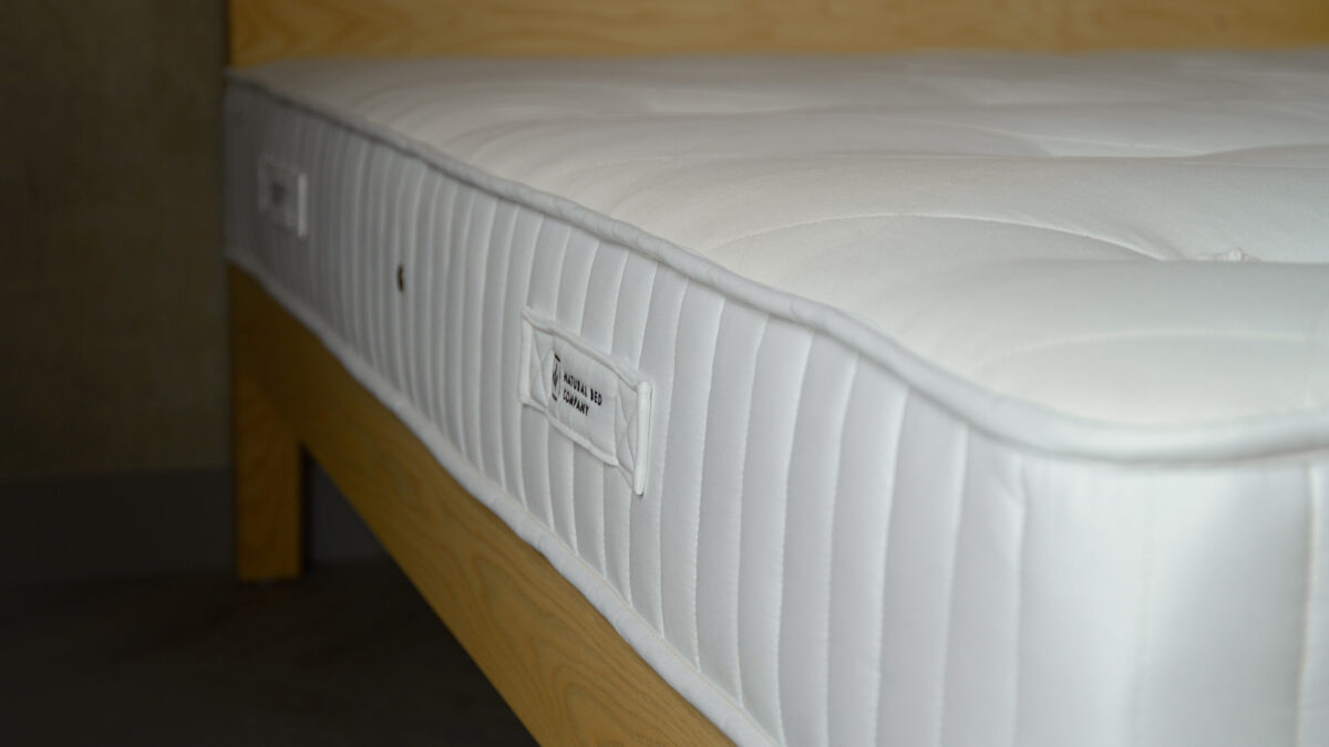 latex and coir eco mattress with cotton handle detail