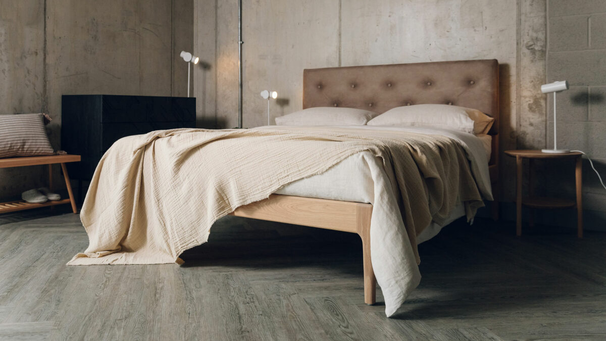 neutral naturals colour scheme with a crinkle texture lightweight sand coloured bedspread and ecru linen bedding