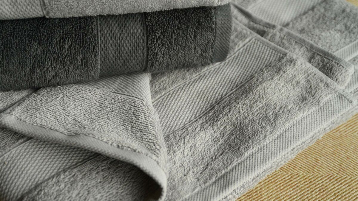light cotton terry towels in slate and dove grey