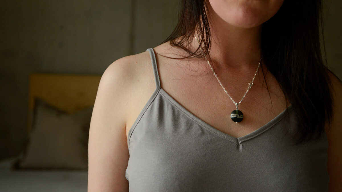 light grey vest top neckline detail
