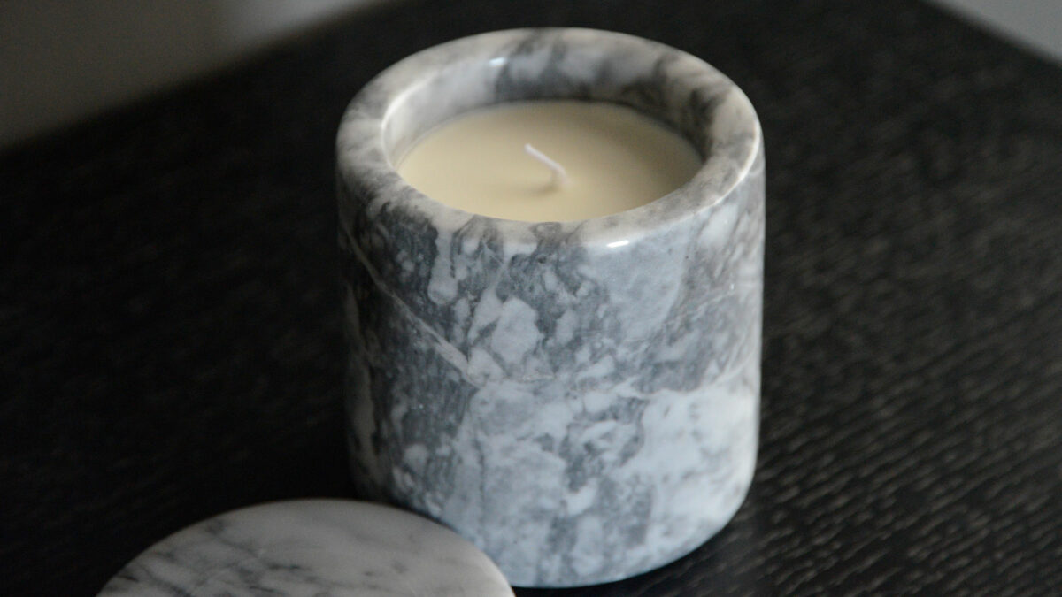 Luxury scented candle in grey marble pot with lid