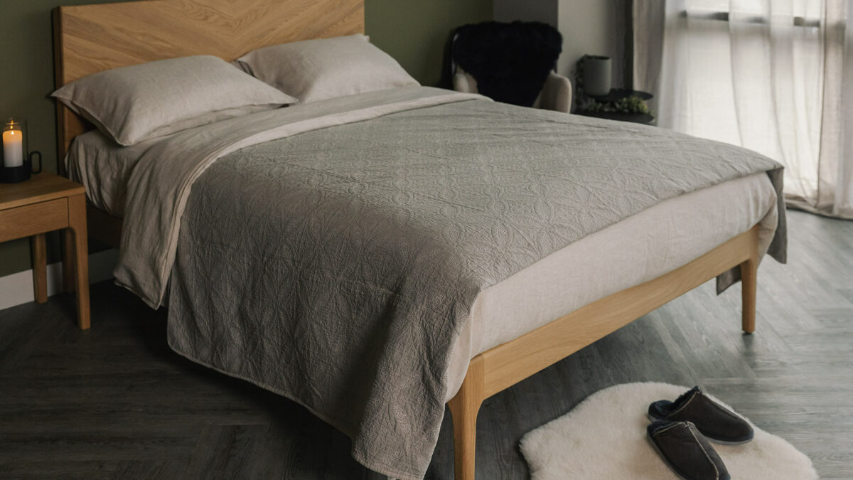 lightweight taupe bedspread with embroidered look design