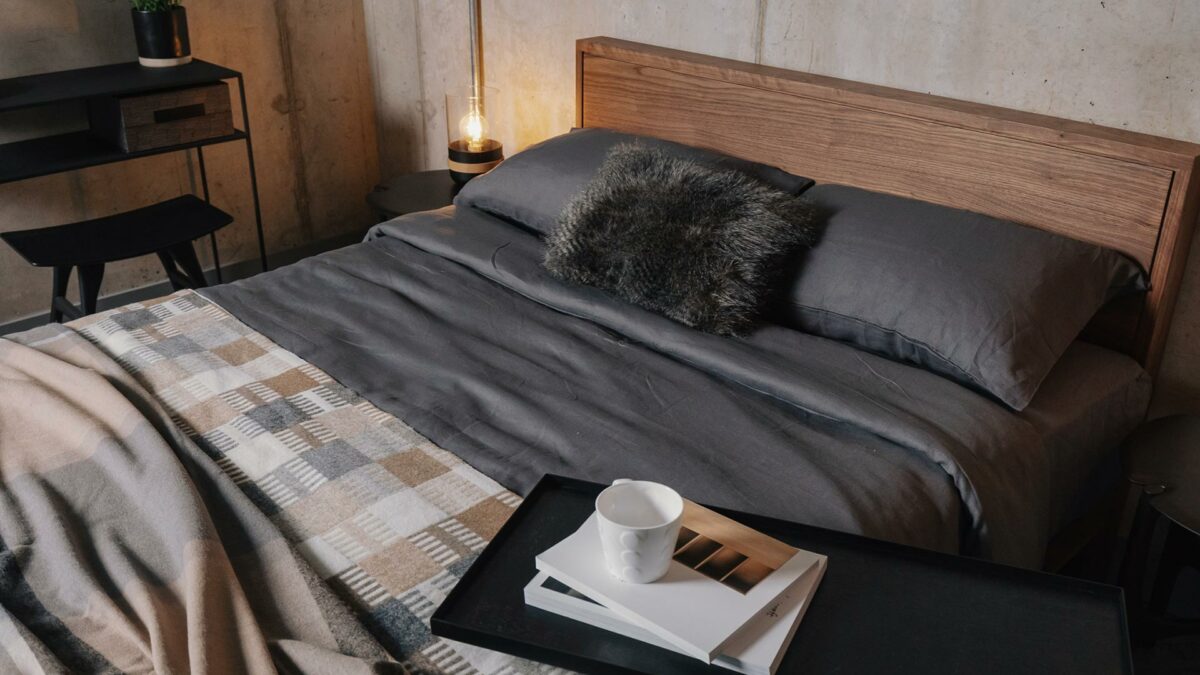 dark grey linen bedding on a kingsize walnut Leith bed for a Nordic look