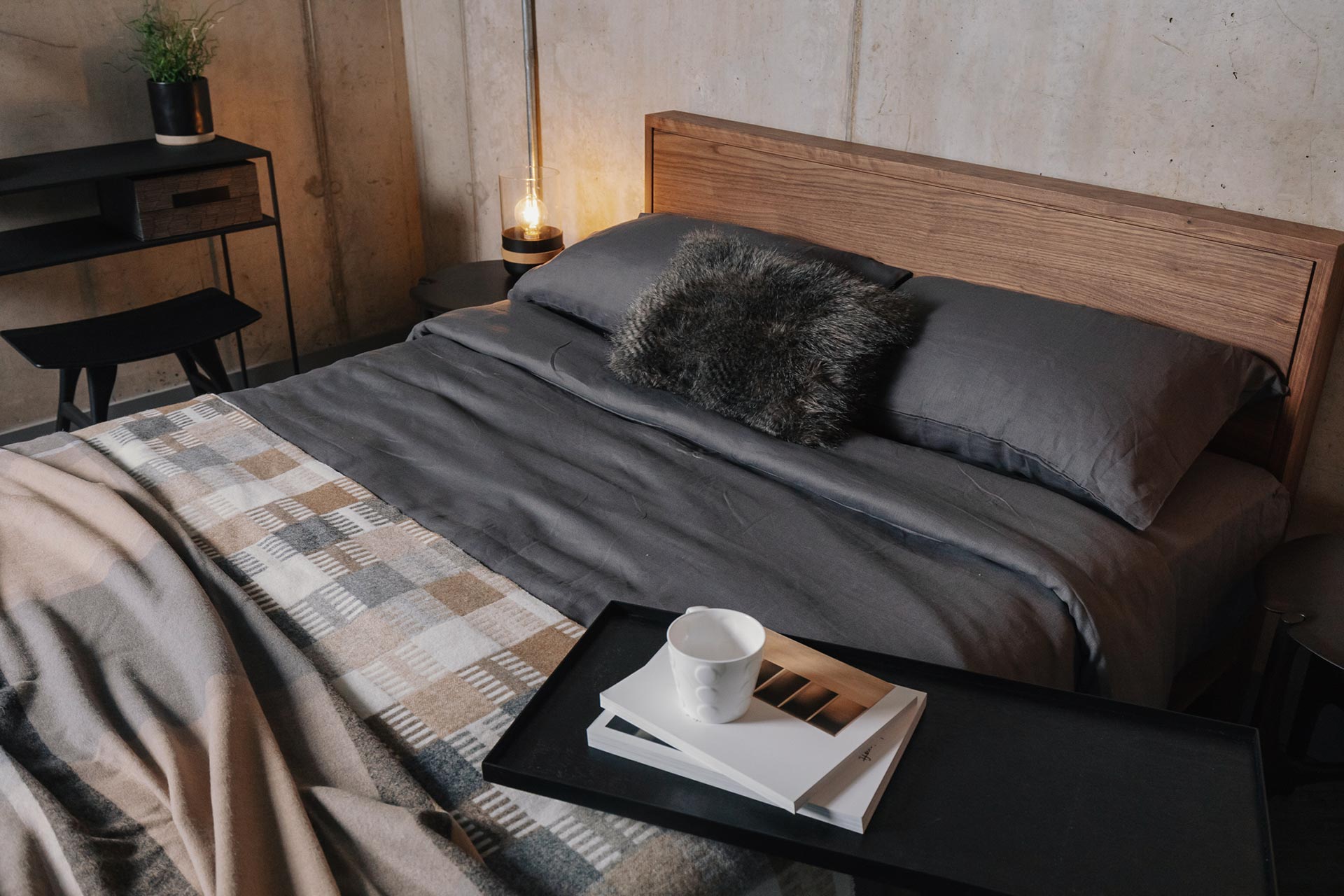 dark grey linen bedding on a kingsize walnut Leith bed for a Nordic look