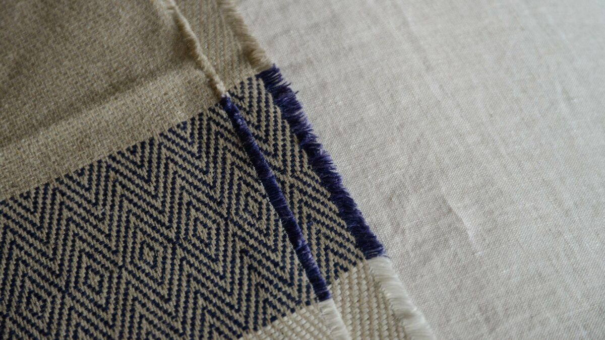 linen and wool blend woven throw with pattern texture and colour