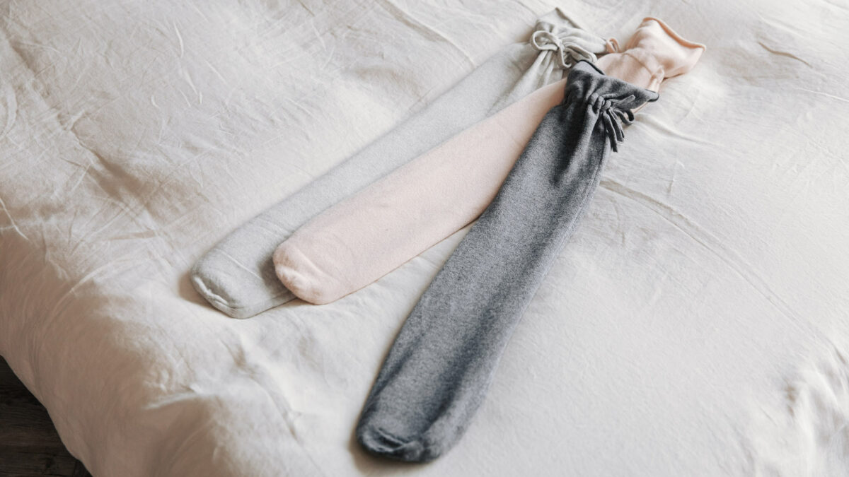 long hot water bottles with knitted cover